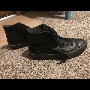 Black leather high top Converse All-Stars